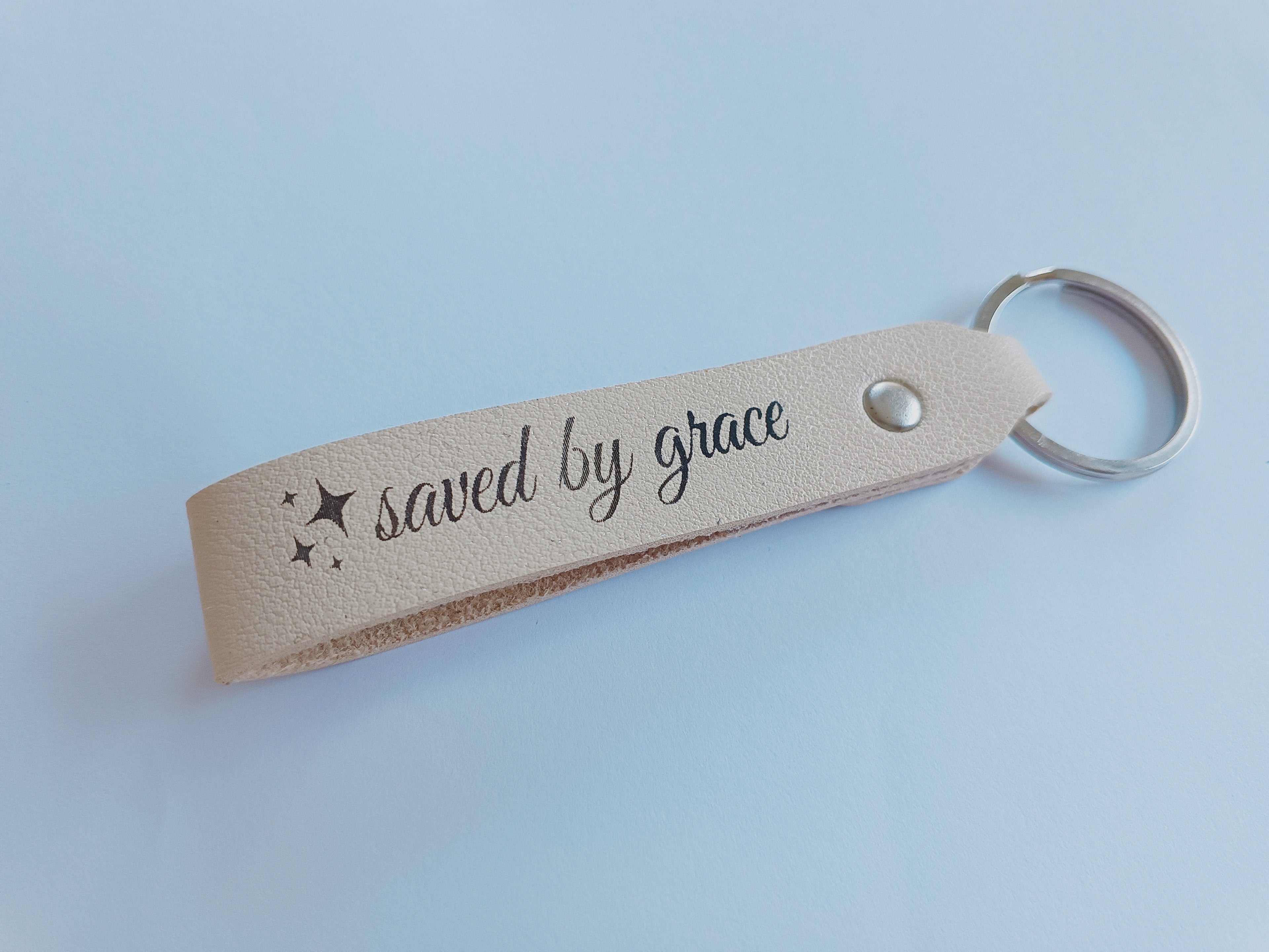Saved by Grace leather keychain