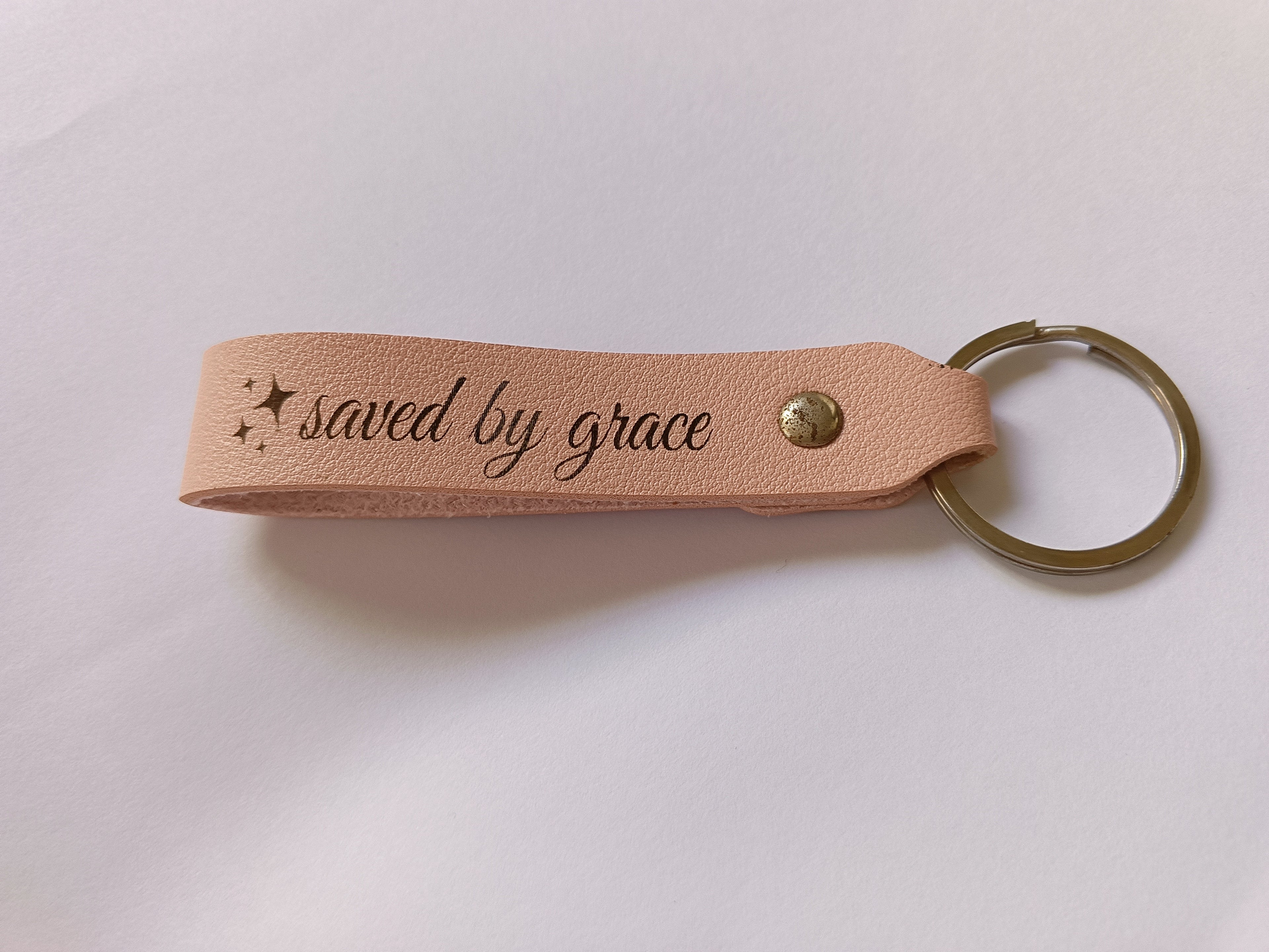 Saved by Grace leather keychain