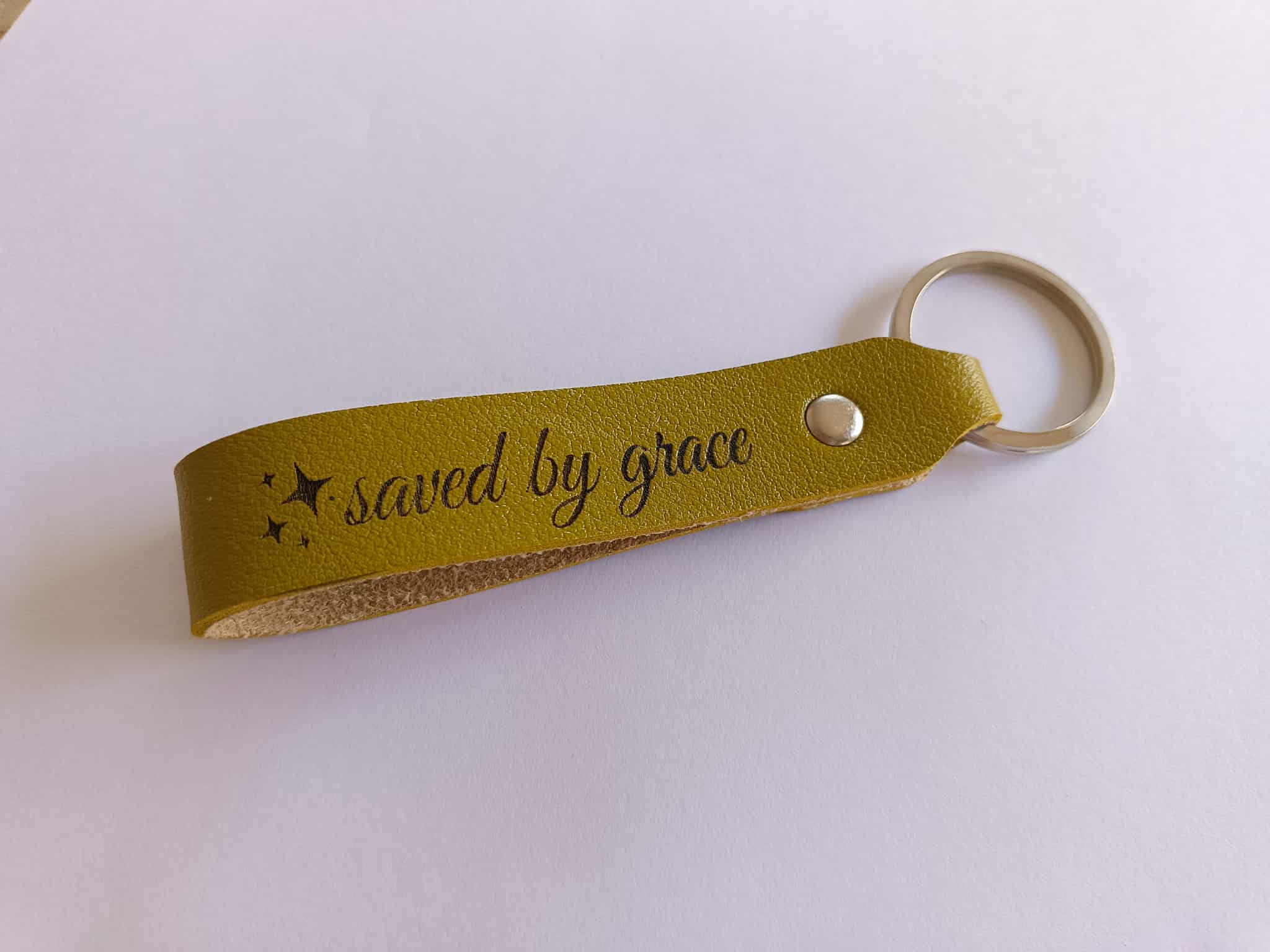 Saved by Grace leather keychain